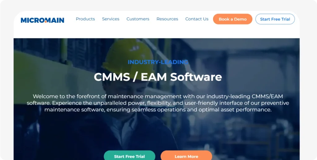 MicroMain CMMS/EAM software homepage with maintenance worker background, promotional text, and CTA buttons for free trial and demo.